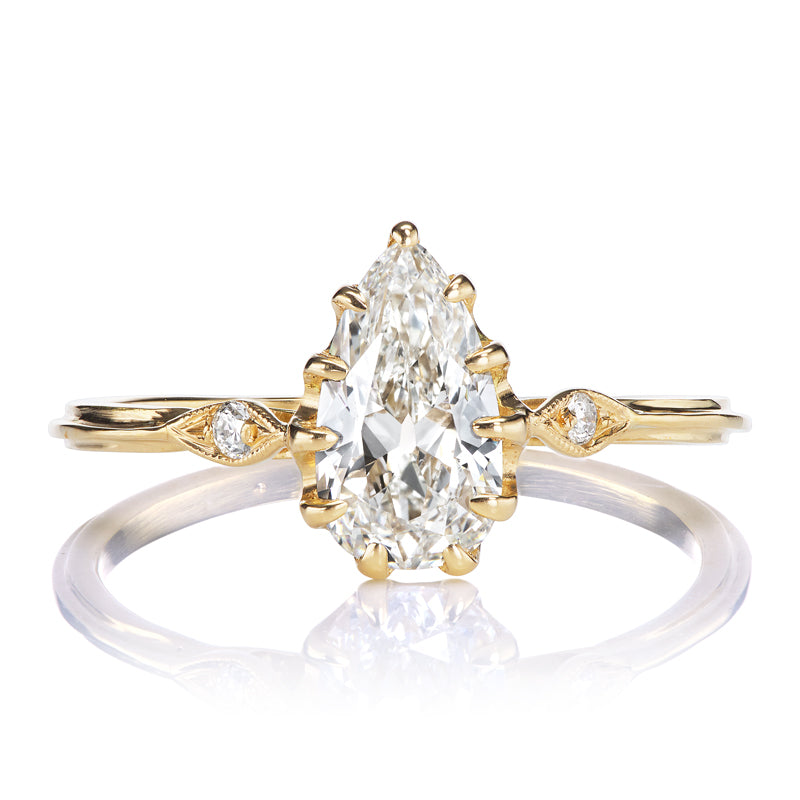 1.12 Carat Pear Cut Diamond Engagement Ring with Leaf-Like Shoulder Details