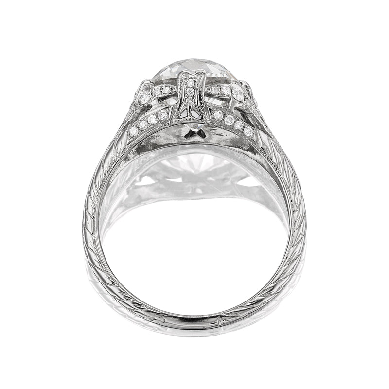 Amma 2.78 elegant silver ring with intricate detailing and sparkling stone viewed from below on white background