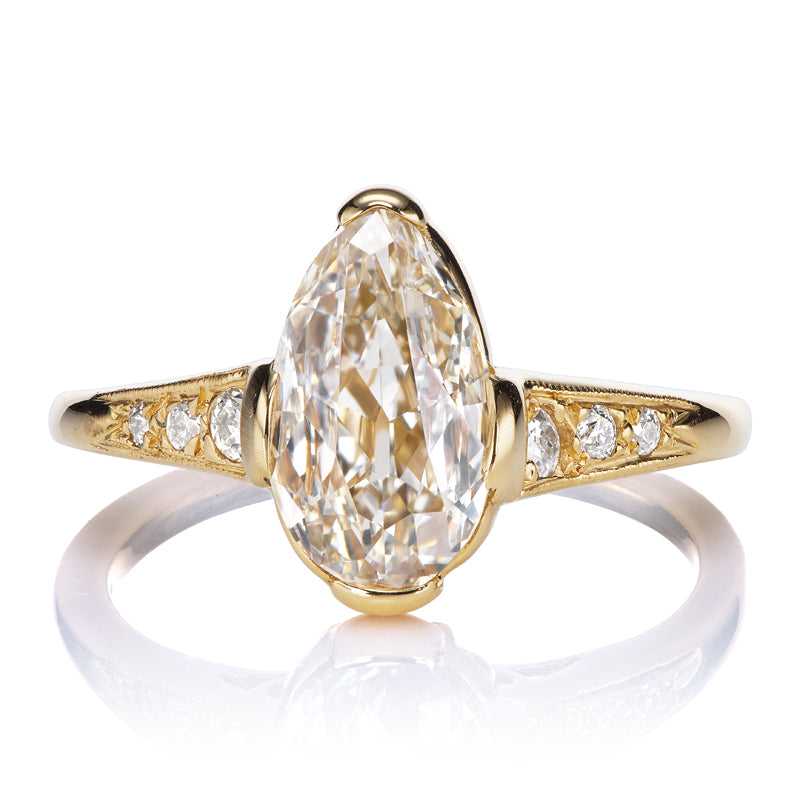 Elongated Champagne Pear Diamond with Elegant Side Stones