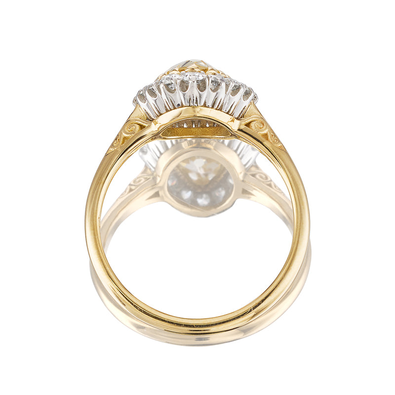 fancy color, vs clarity diamond in two-tone setting