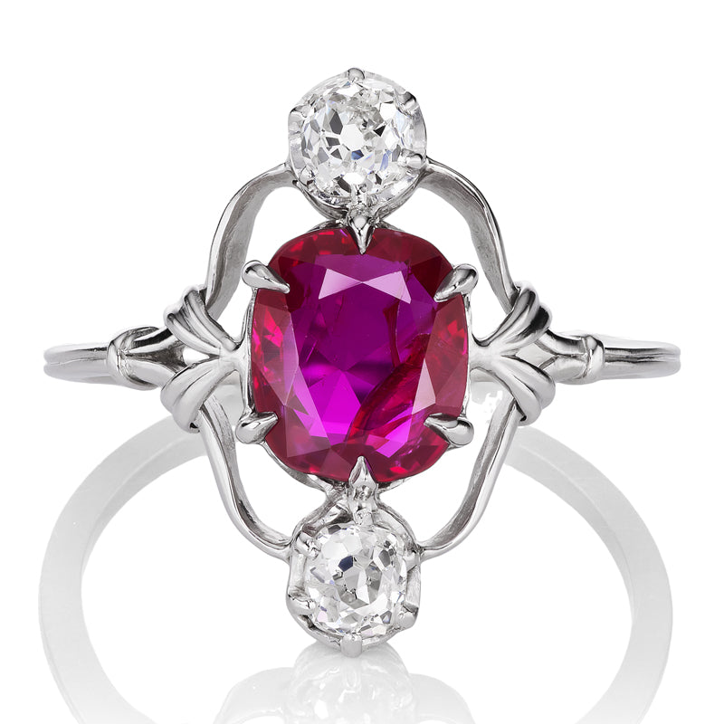 Unique Platinum Diamond Ring with Ruby Center Stone