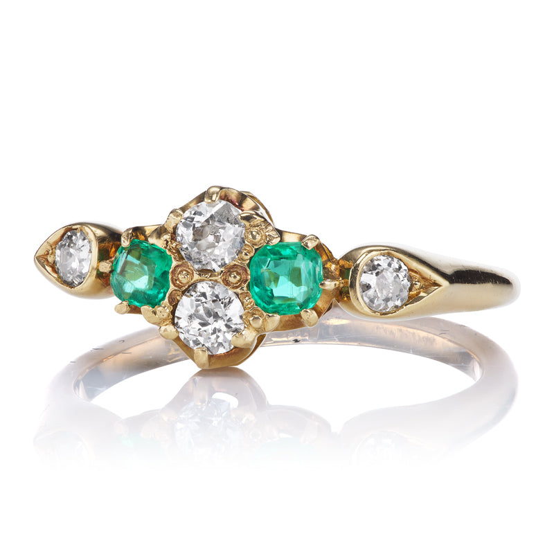 Antique Diamond and Emerald Half Hoop diamond engagement ring with gemstone