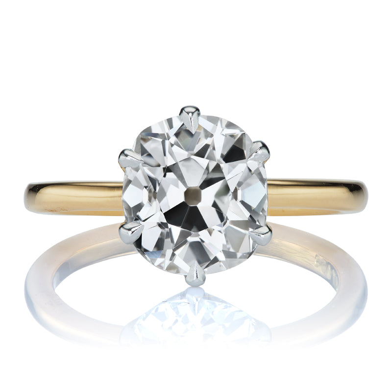 Bright White Elongated Old Mine Cut Diamond in Two-Tone Solitaire Setting