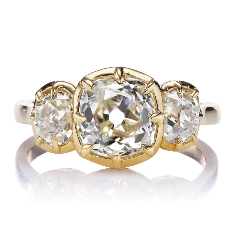 Three Stone Diamond Ring in 18kt Gold Collet Setting