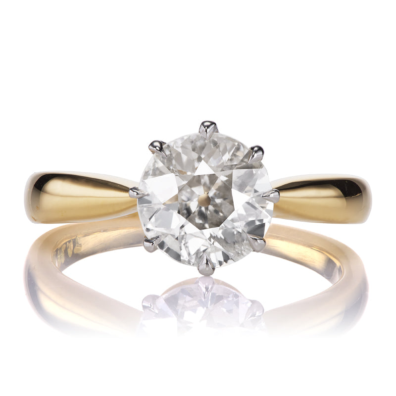 Unique Old European Cut Diamond in Tapered Solitaire Setting