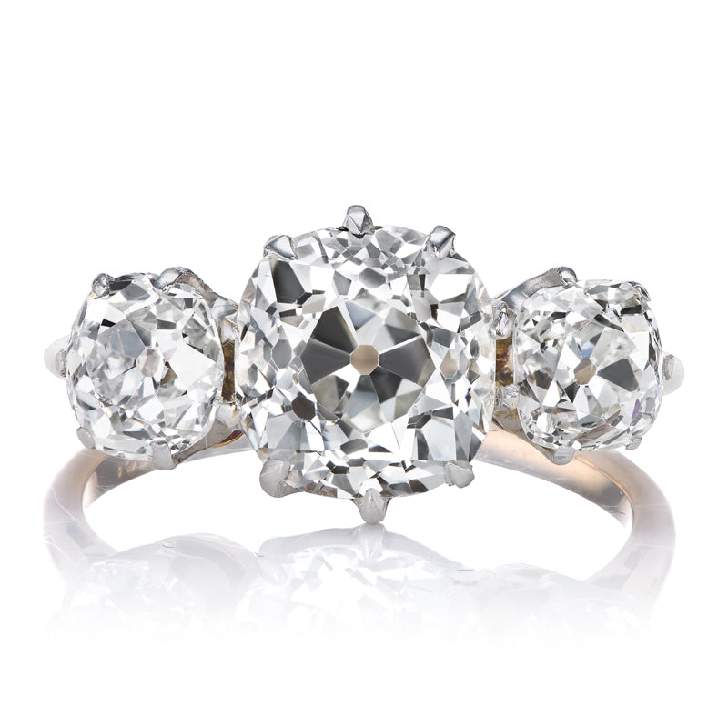 Antique Three Stone Old Mine Cut Diamond Ring in Two-Tone Setting