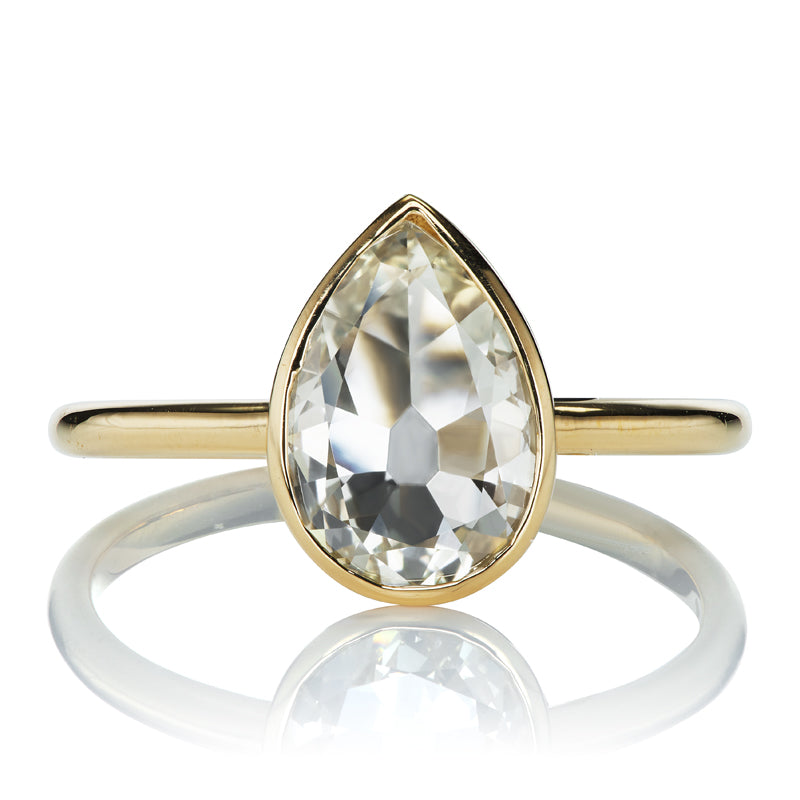 1 Carat Antique Pear Cut Diamond in Yellow Gold Bezel Setting