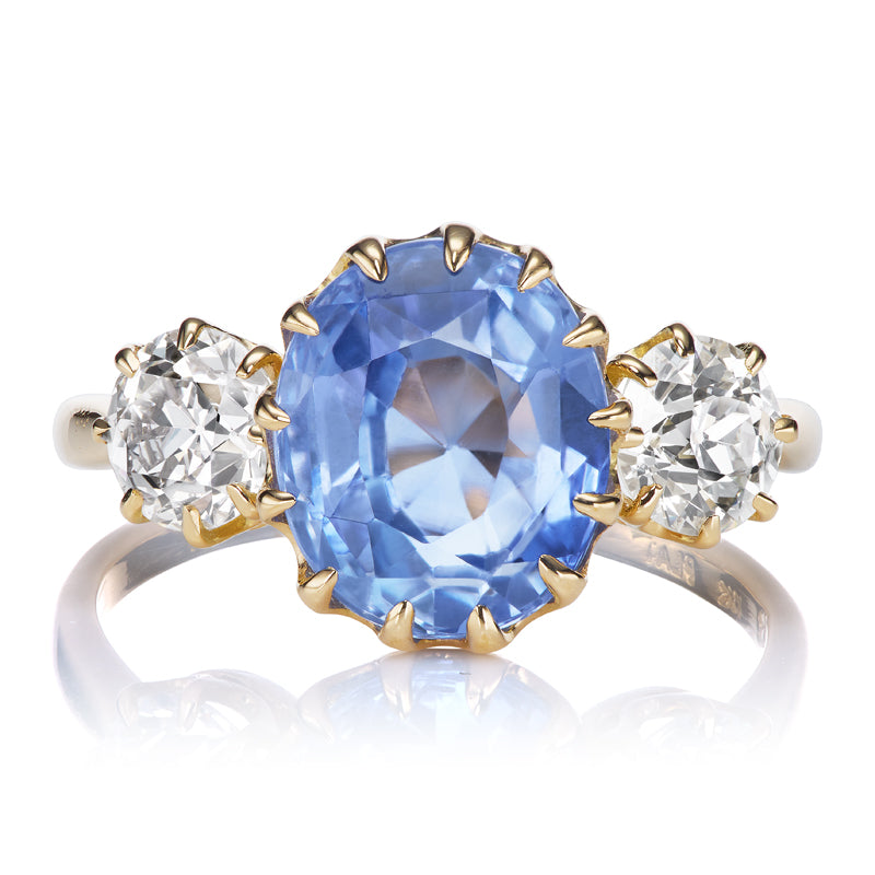 Three Stone Oval Cut Light Blue Sapphire with OEC Diamond Side Stones