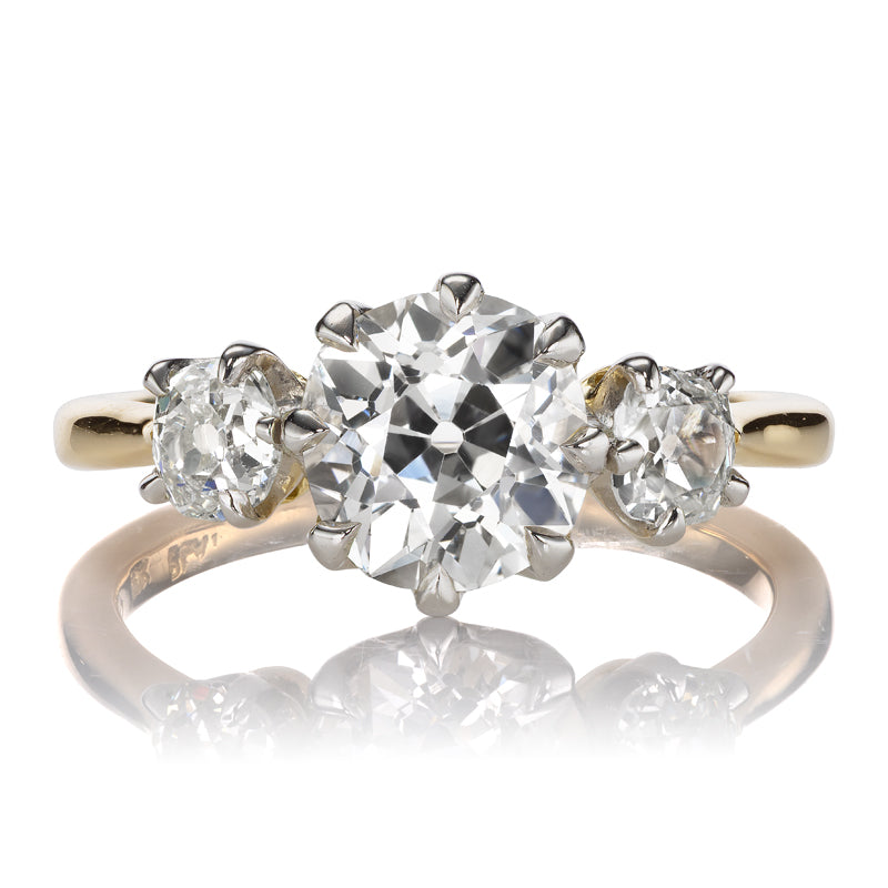 Bright Three-Stone Diamond Ring in Two-Tone Setting