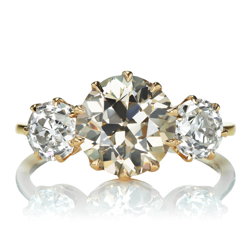 Champagne Colored Transitional Cut Diamond in Three Stone Setting