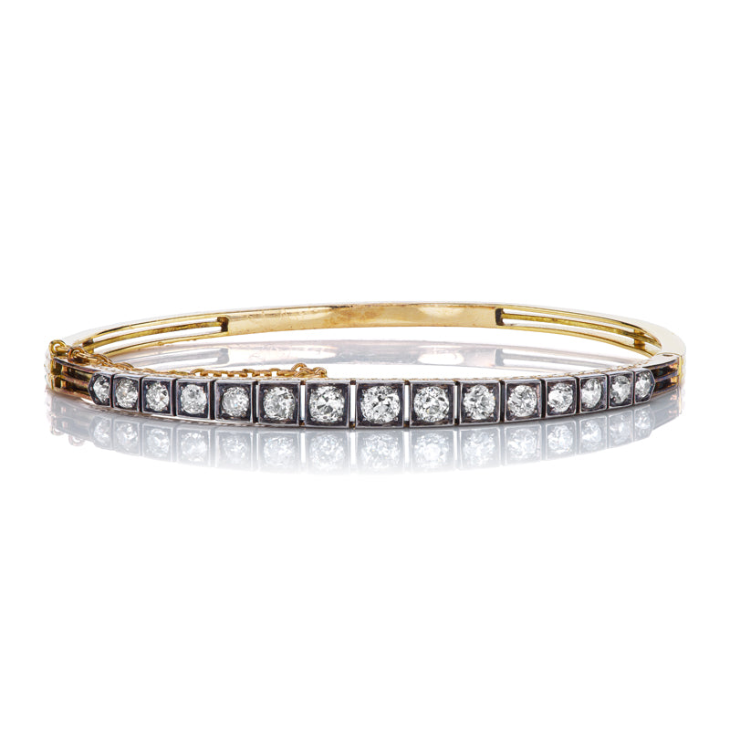 Antique Two-Tone Bangle Featuring 15 Old Mine Cut Diamonds