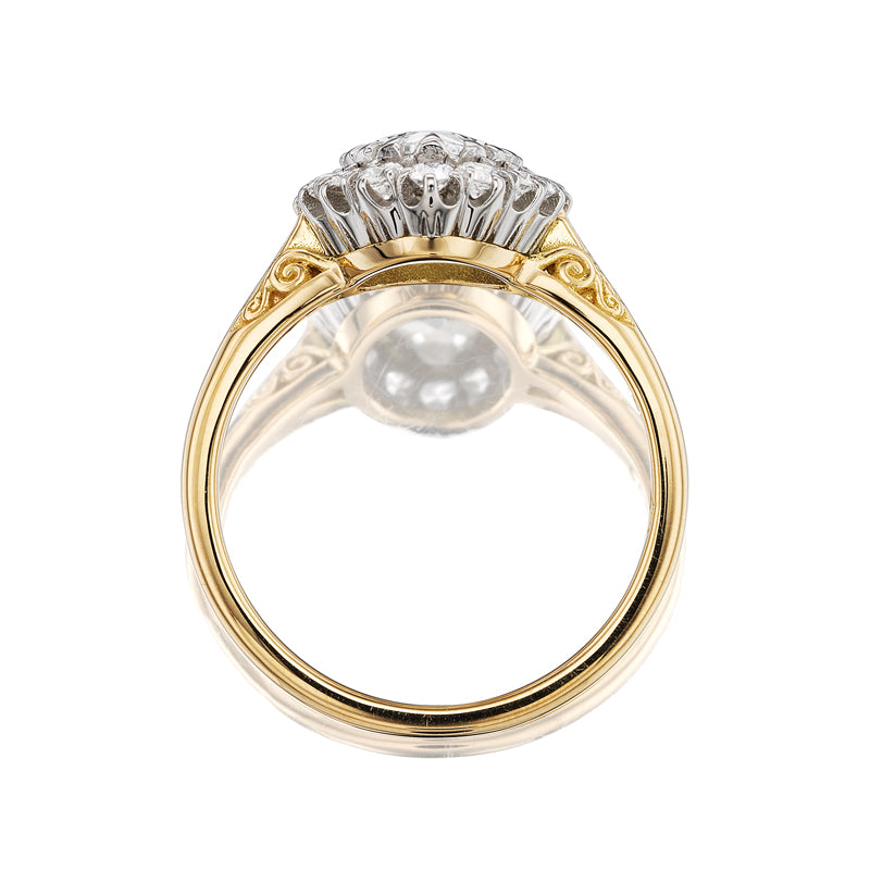 g-h-i color, si-i clarity diamond in two-tone setting