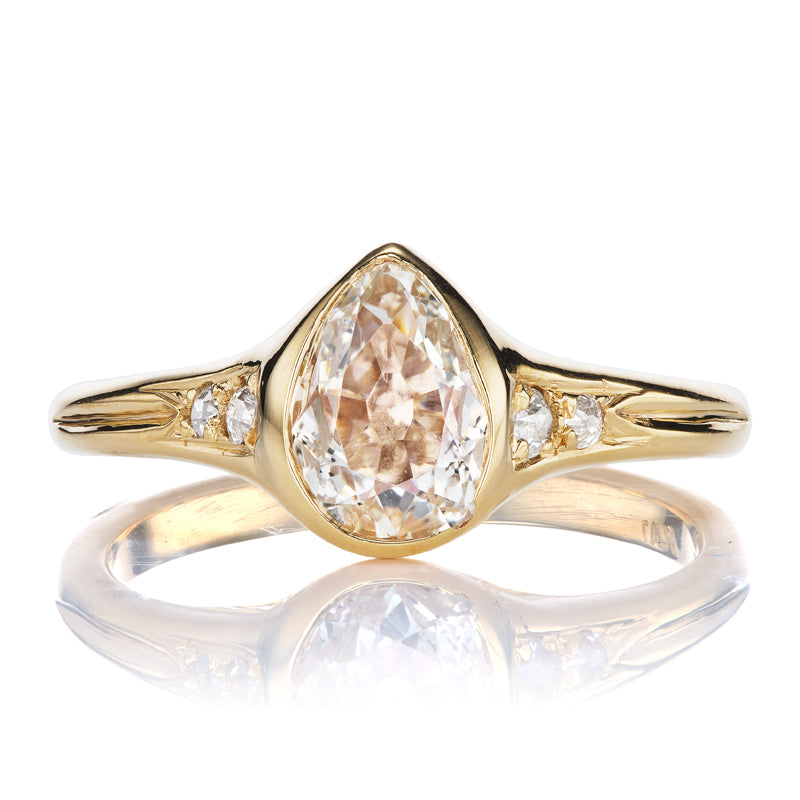 0.72 Carat Pear Cut Diamond Engagement Ring with Side Stones