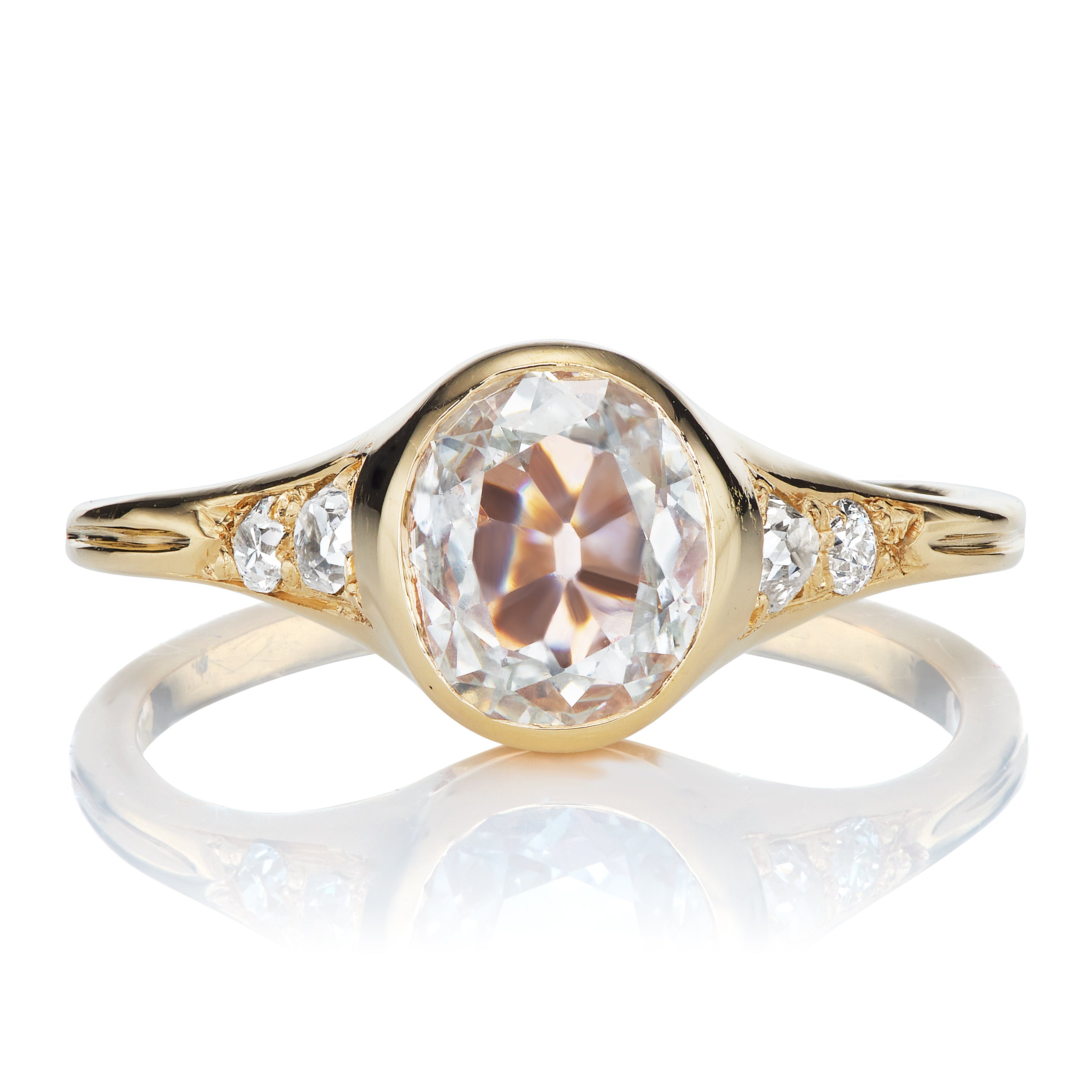 Flat Oval Diamond Bezel Set in Yellow Gold
