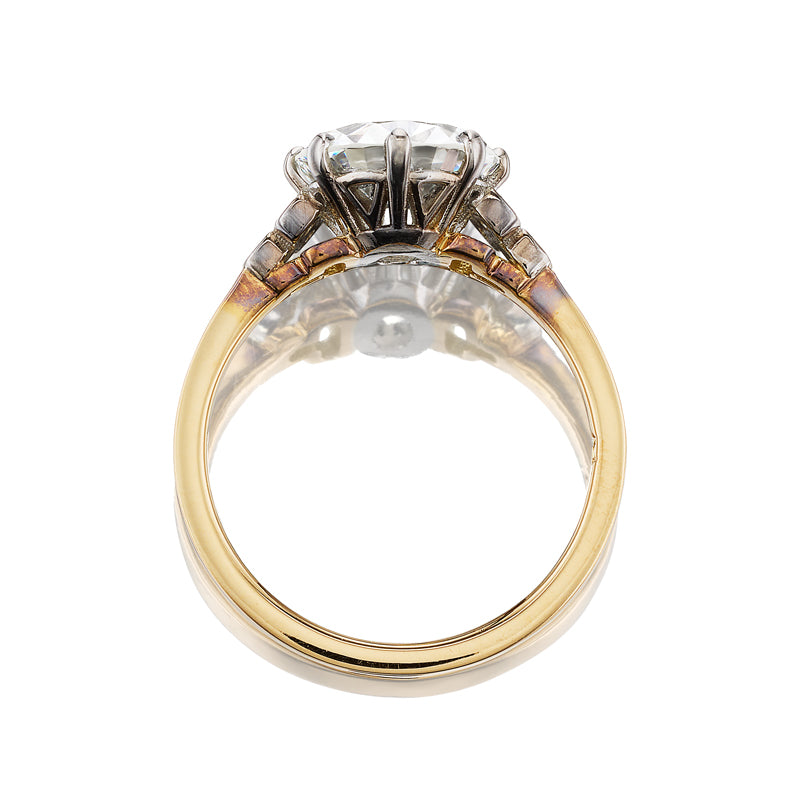 j-k-l color, si-i clarity diamond in yellow gold setting