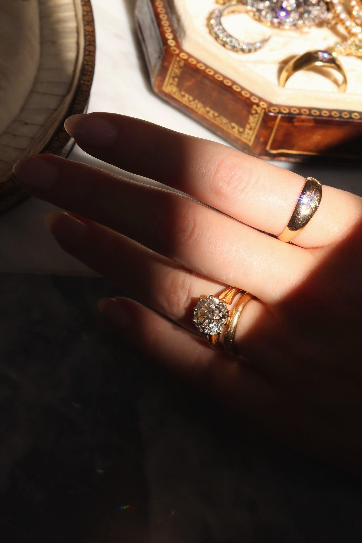 j-k-l color, si-i clarity diamond in yellow gold setting