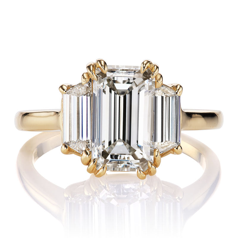 2 carat Emerald Cut Diamond Ring with Trapezoid Side Stones