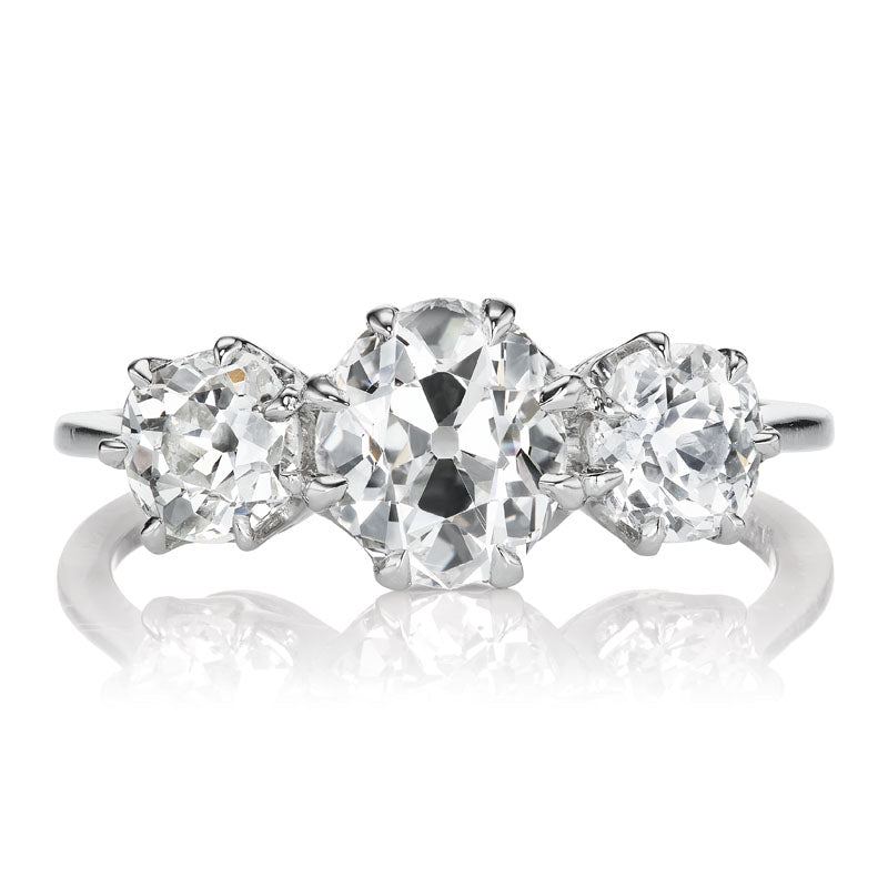 High Color Oval Cut Diamond Three Stone Ring in Platinum Setting