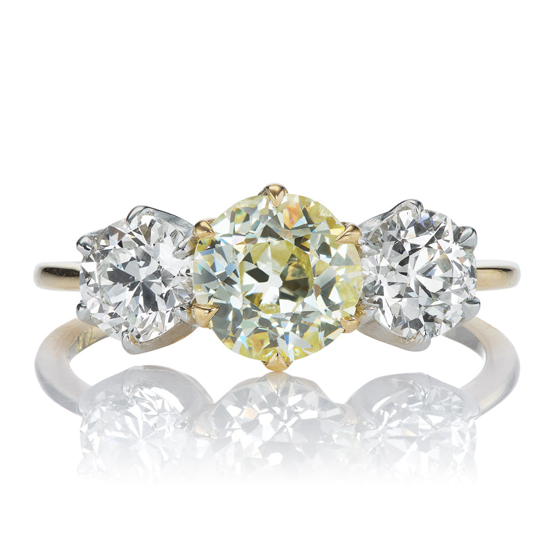 1.23ct Yellow Toned Old European Cut Diamond with Side Stones