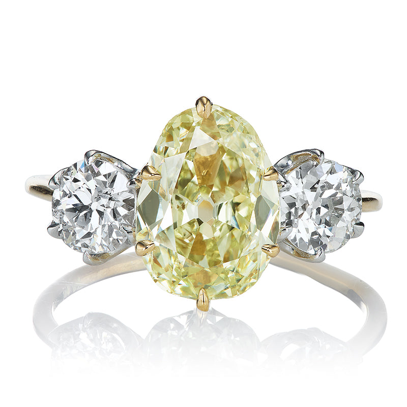 Rare 2.33ct Fancy Yellow Pear Shaped Diamond with Old Euro Side Stones