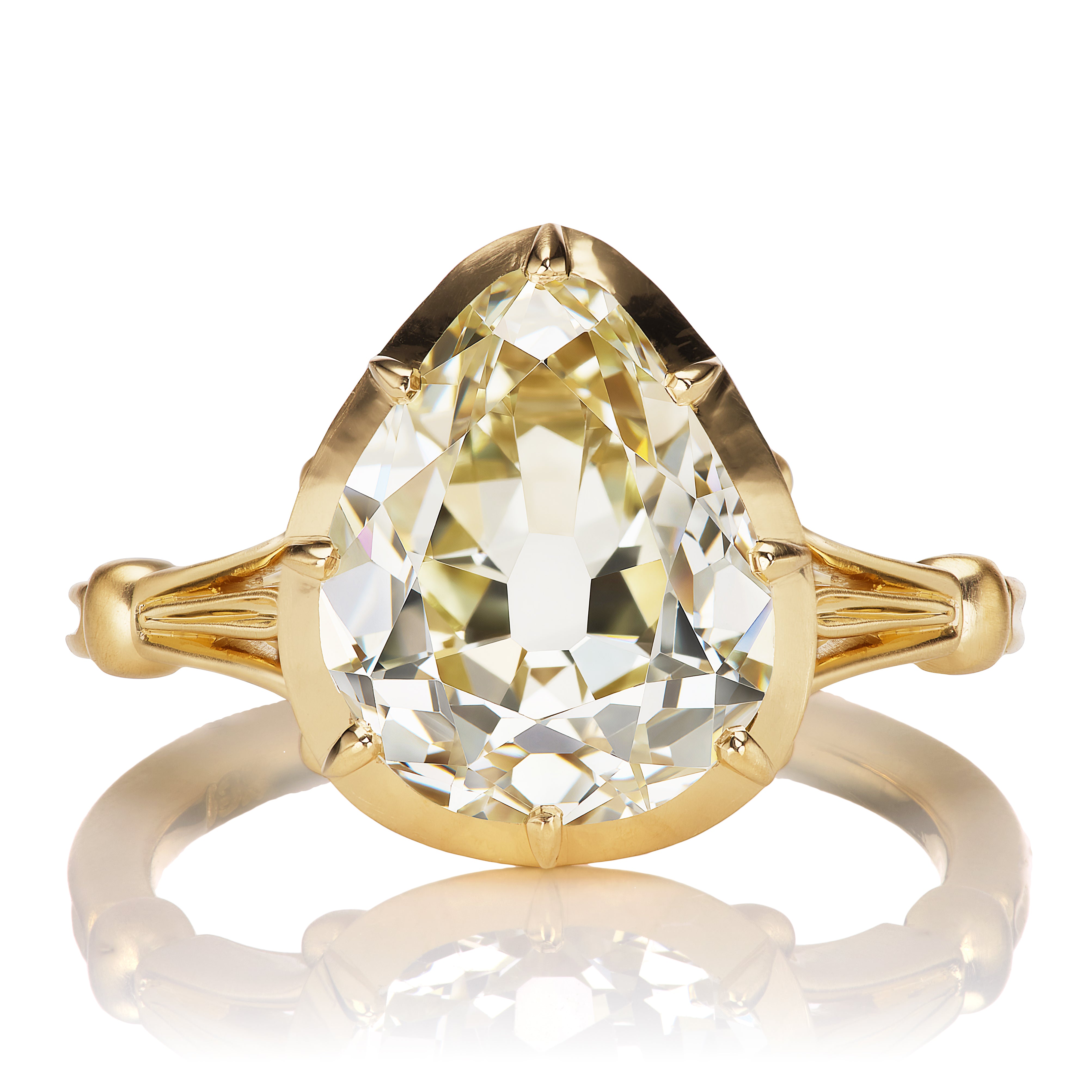 Warm Antique Pear Diamond in Gold Collet Setting