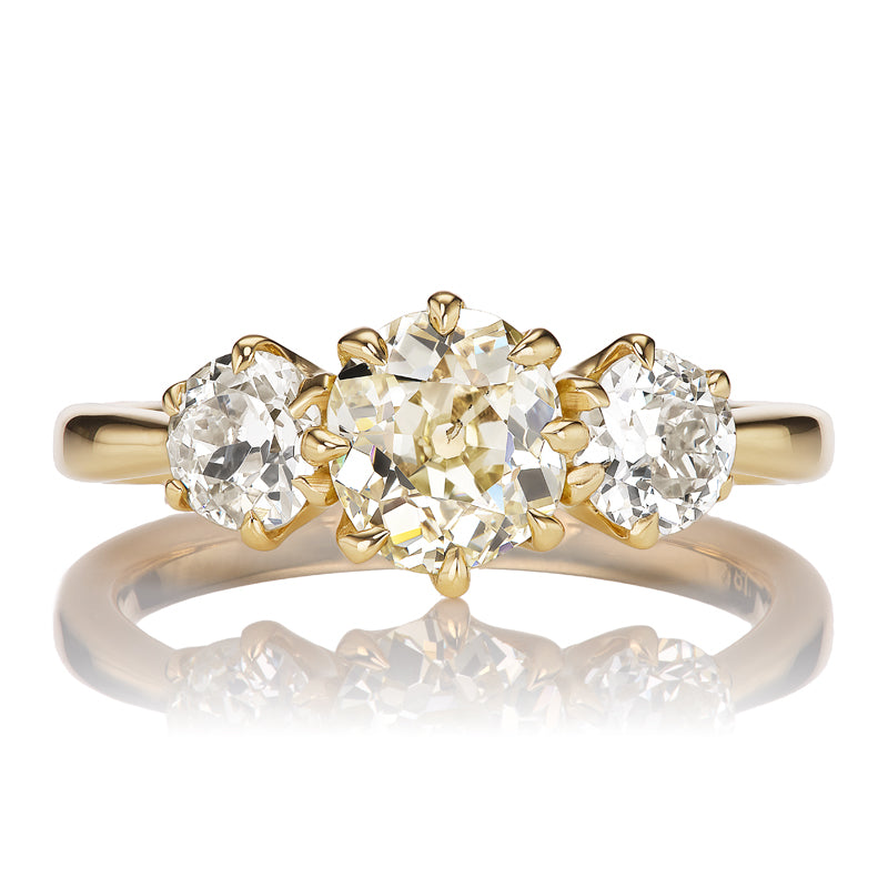 Three Stone Ring with Warm-Hued Antique Old Mine Cut Diamond Center Stone
