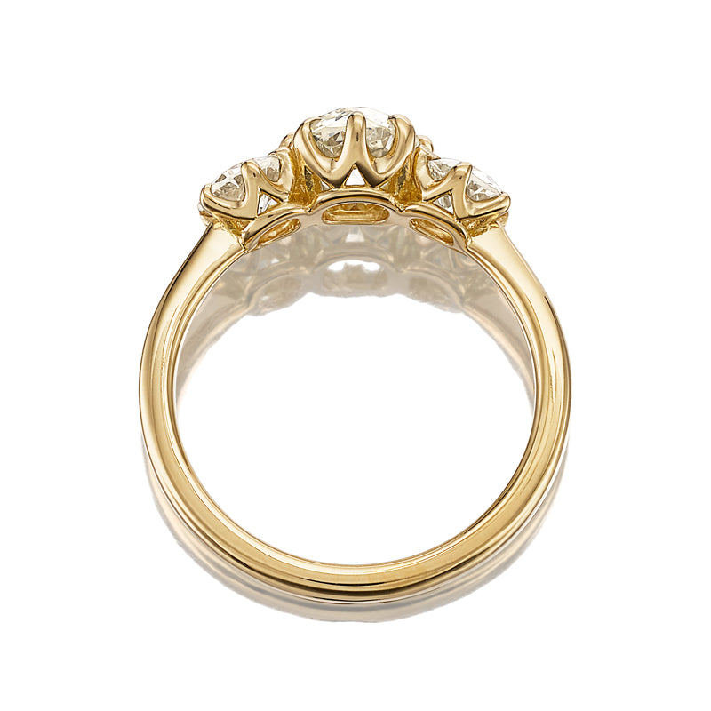 m-z color, si-i clarity diamond in yellow gold setting