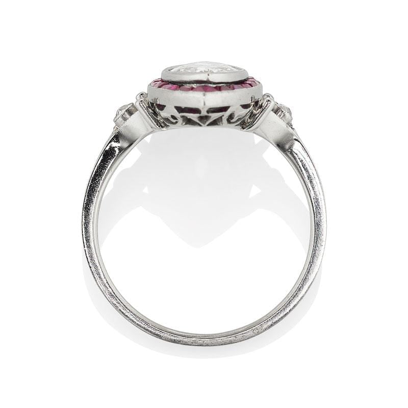 Marquise Cut Diamond Ring with 24 Calibré Cut Rubies