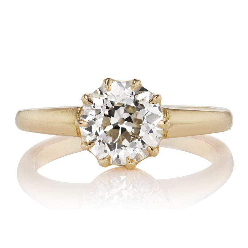 Solitaire Ring in a 10-prong 18 karat Yellow Gold Setting
