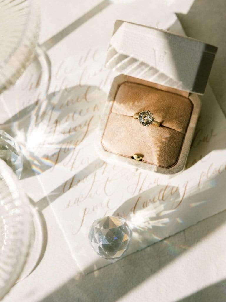 m-z color, si-i clarity diamond in yellow gold setting