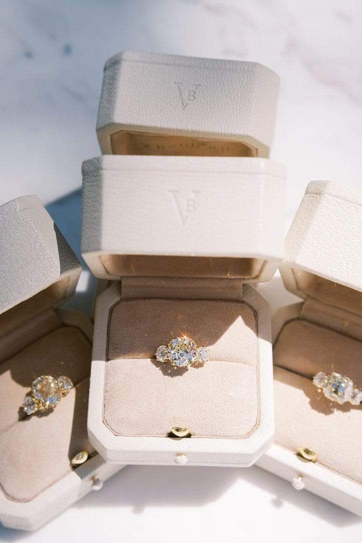 m-z color, si-i clarity diamond in yellow gold setting