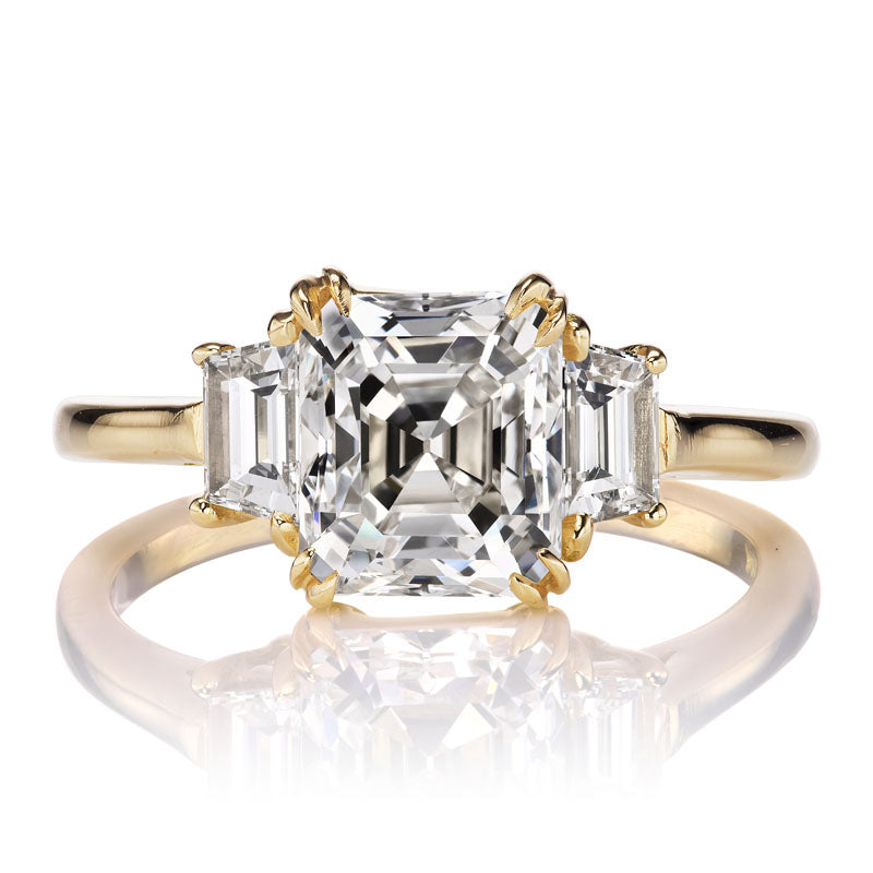 Beautiful Emerald Cut Diamond Ring with Trapezoids
