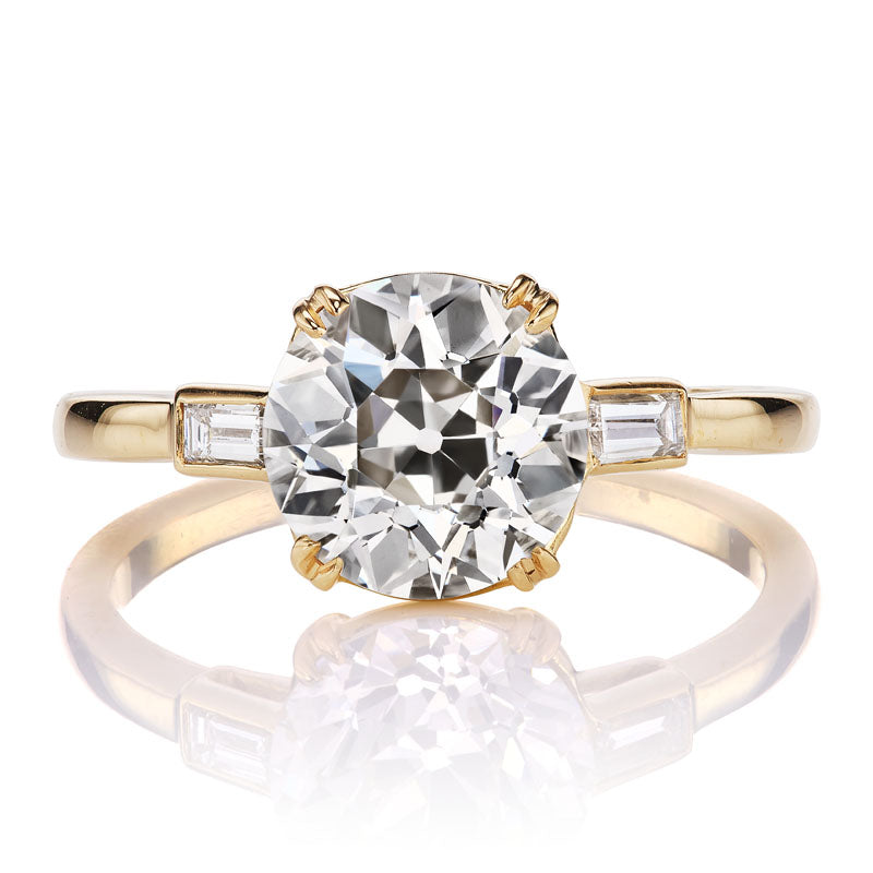 Fiery 2.15 carat Old European Cut Diamond with Chic Baguettes