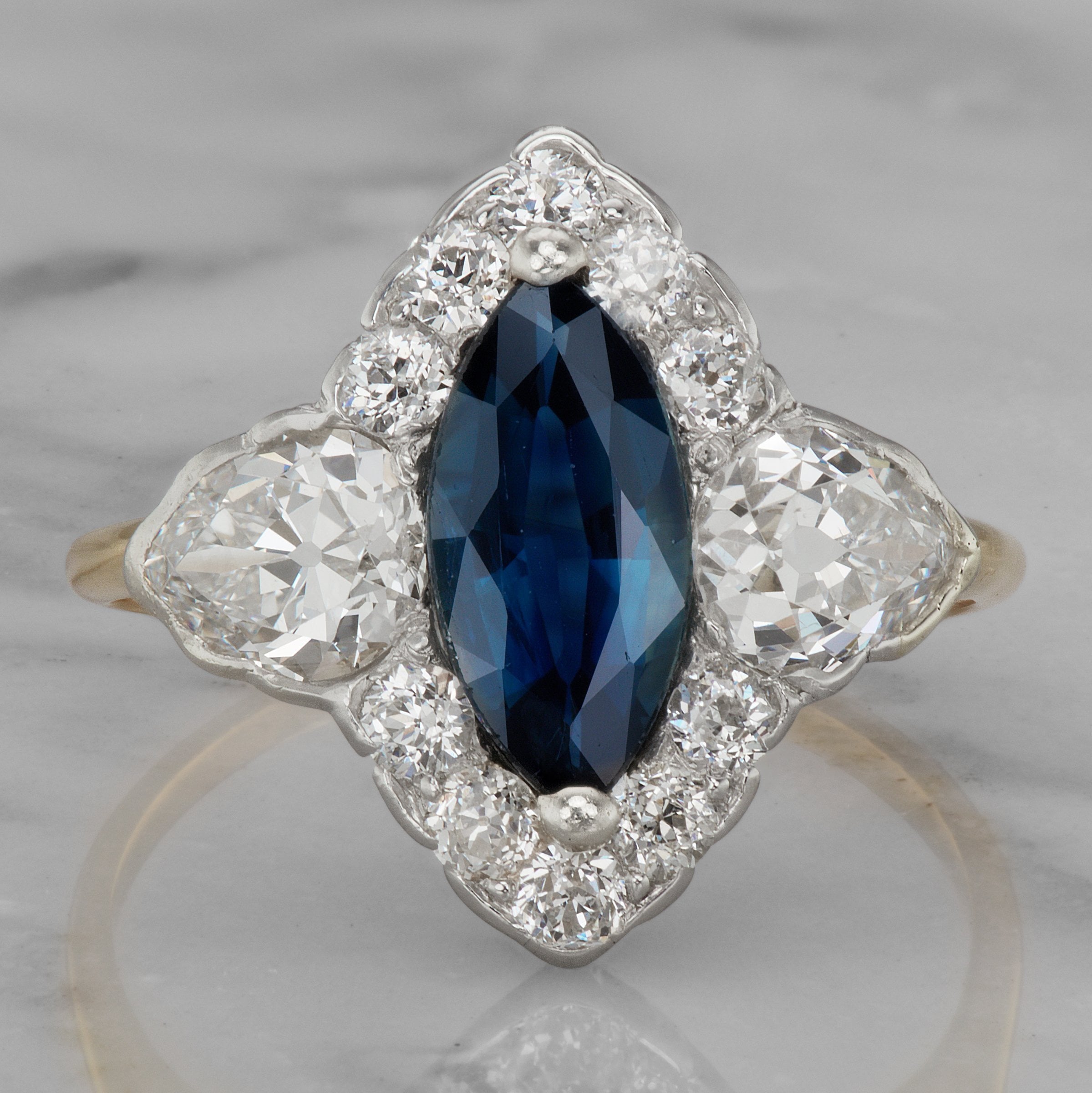 Marquise Cut Sapphire Engagement Ring With Halo | Victor Barbone