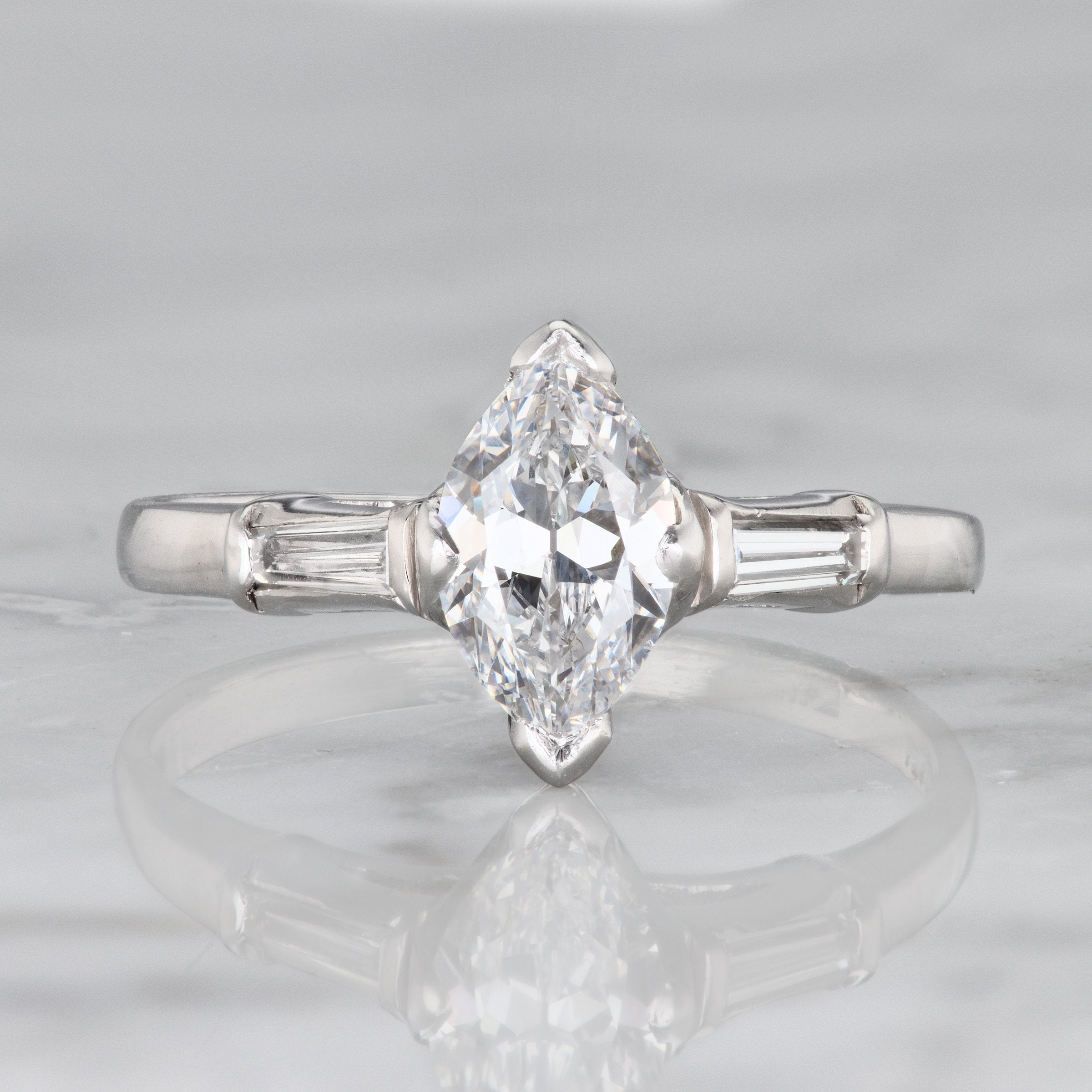 Vintage Solitaire Engagement Ring With Baguettes | Victor Barbone