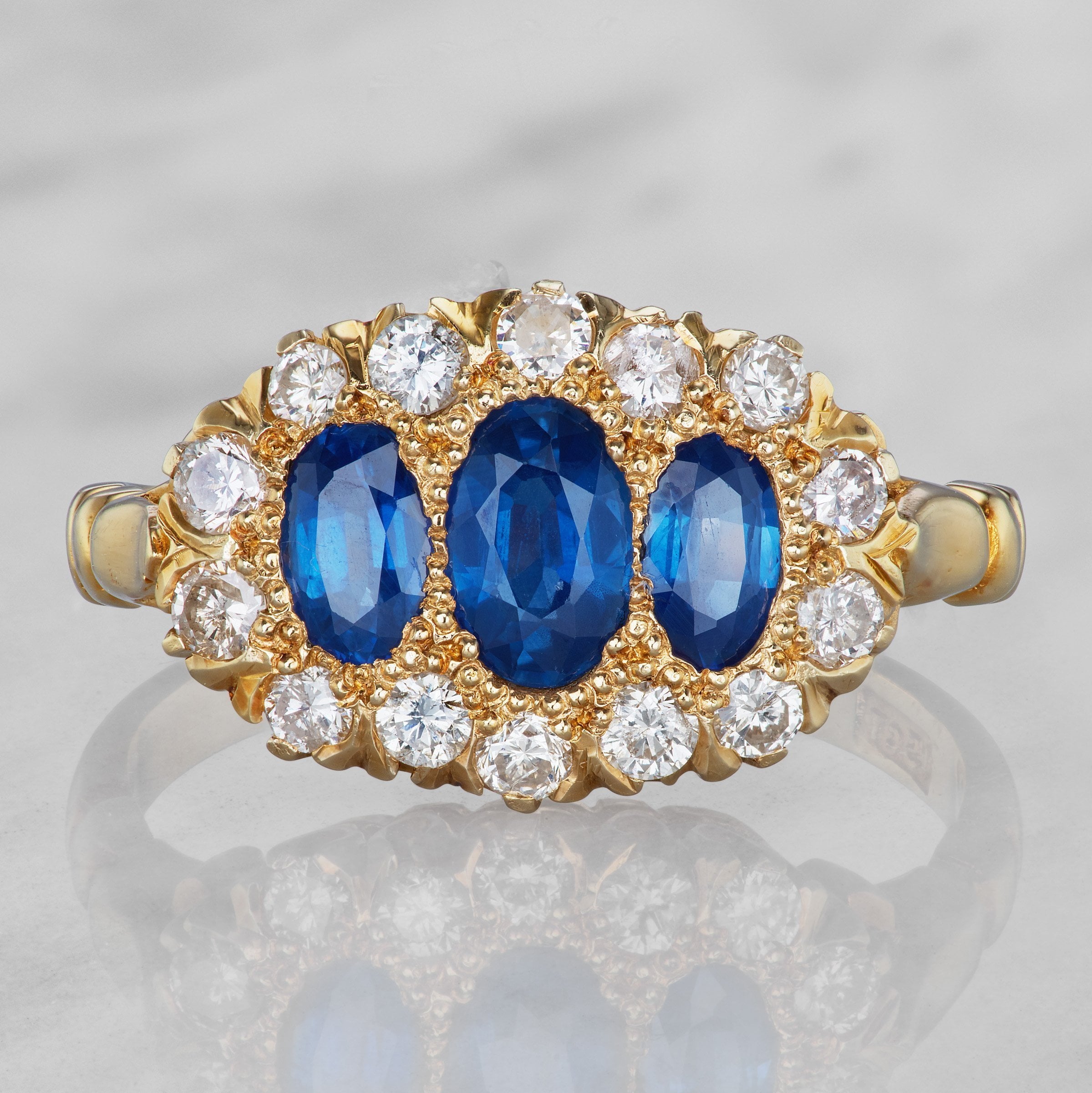 Three Stone Sapphire Engagement Ring With Diamonds | Victor Barbone