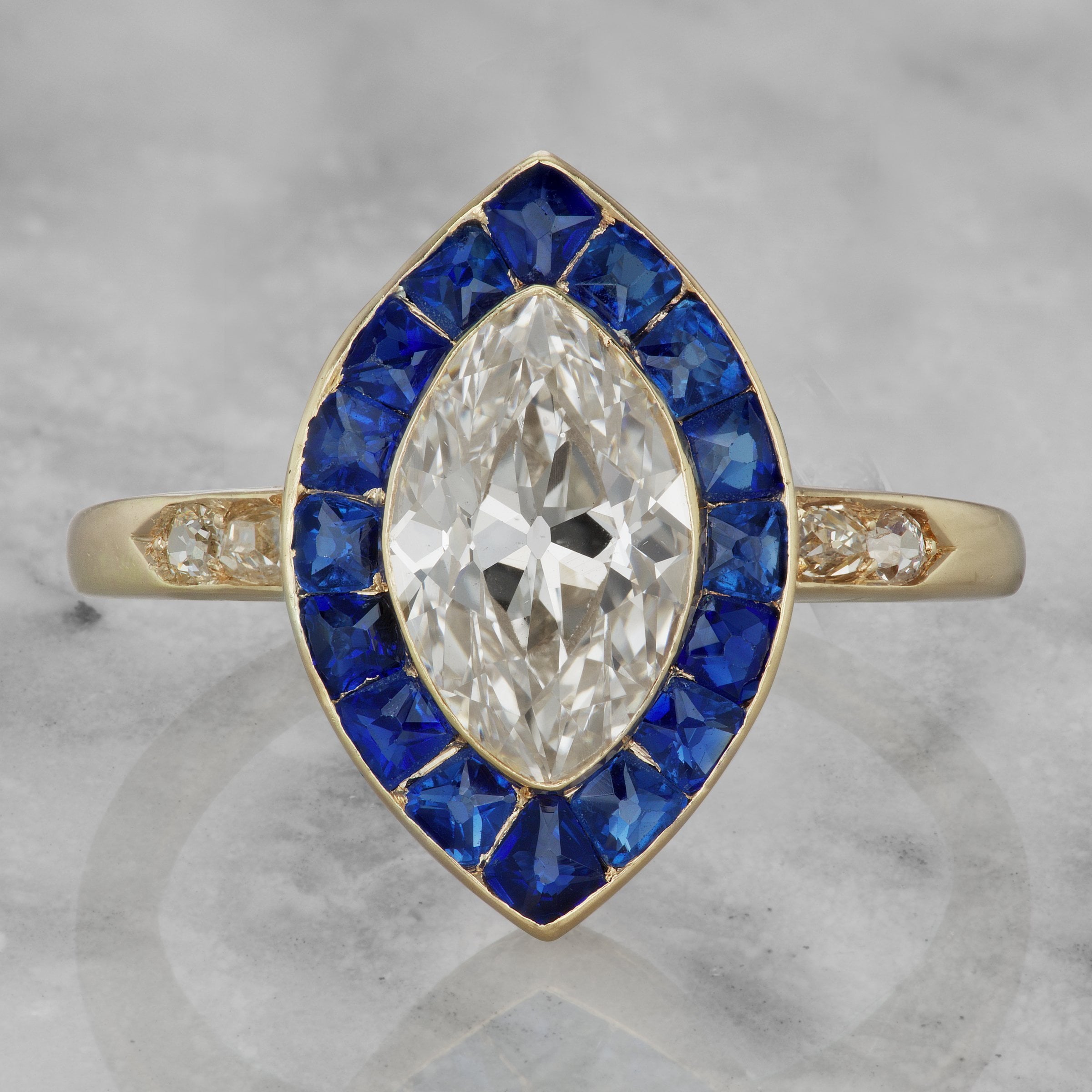 Moval Diamond Engagement Ring With Sapphire Halo | Victor Barbone