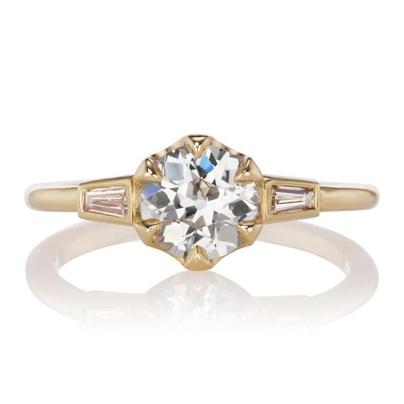 0.94 Carat Diamond flanked by Light Pink Baguettes