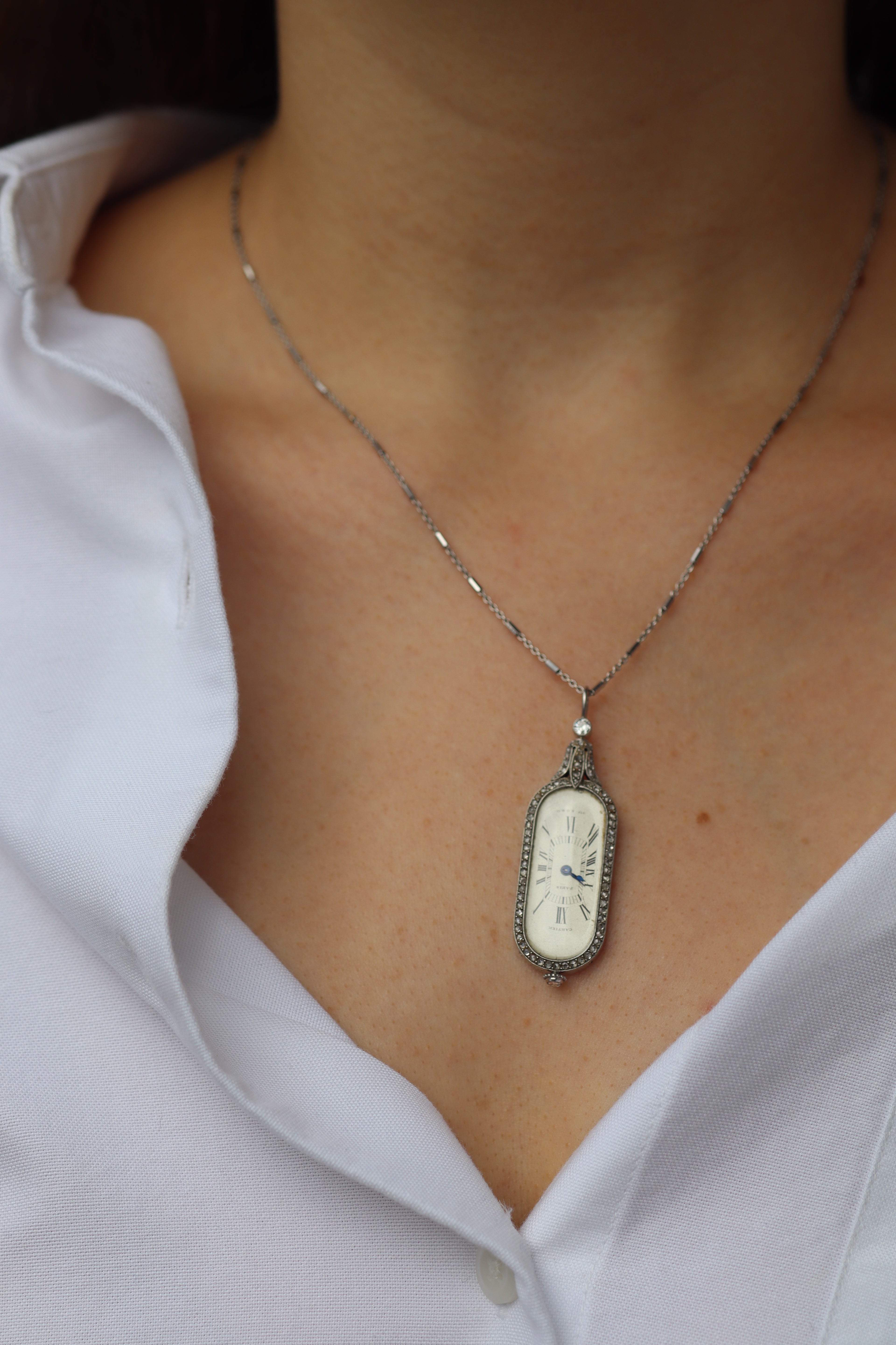 g-h-i color, vs clarity diamond charms & pendants in platinum setting