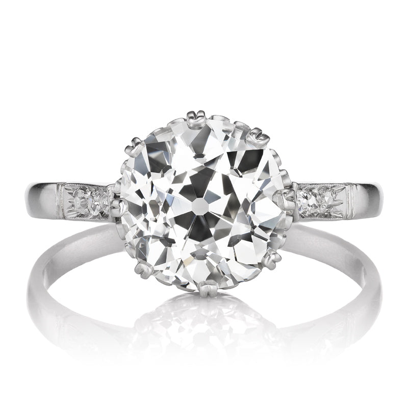 Antique Platinum Solitaire Diamond Ring with Side Stones
