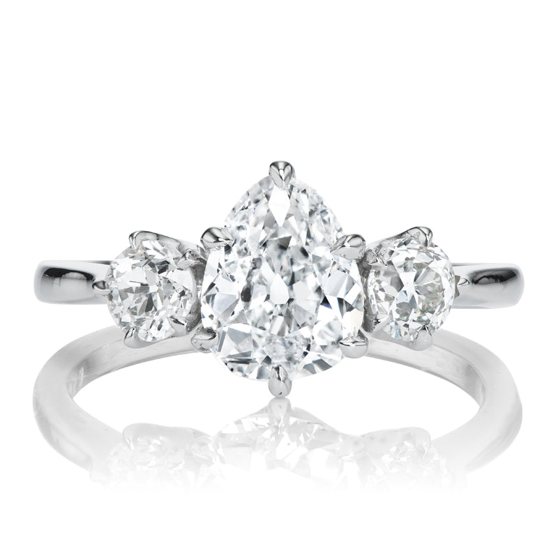 Bright White Pear Cut Diamond Three Stone Engagement Ring