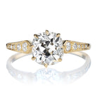 1.60ct Old Mine Cut Diamond Engagement Ring with Winged Shoulders and Side Stones