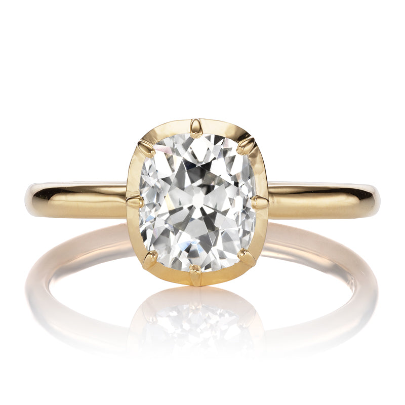 Elongated Old Mine Cut Diamond in Yellow Gold Collet Setting
