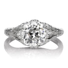 Amma 2.78 vintage style engagement ring with large round diamond and intricate metalwork band design