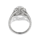 Amma 2.78 elegant silver ring with intricate detailing and sparkling stone viewed from below on white background
