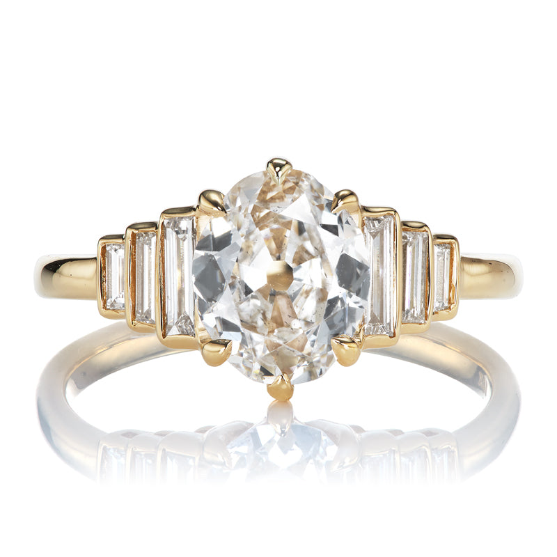 Antique Oval Cut Diamond Engagement Ring with Baguettes