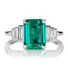 Gorgeous Colombian Emerald Ring with Step Down Diamond Baguettes in Platinum