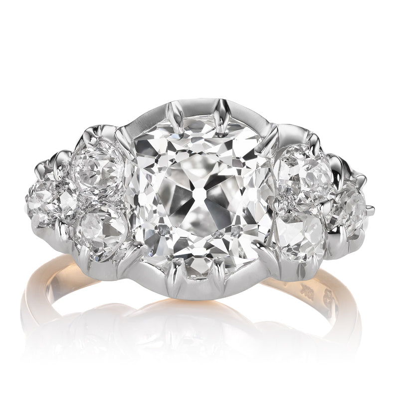 Old Mine Cut Diamond with Side Stones in Collet Setting