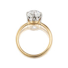 Gold ring with a diamond on a white background