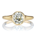 Warm Colored Old Mine Cut Diamond in Bezel Set Yellow Gold